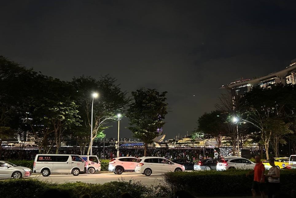 crowd at the promontory viewed from the lawn