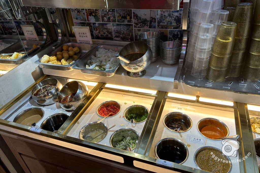 condiment station at la jiang shan hotpot