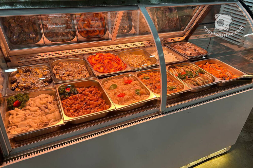 second fridge of seafood options laut