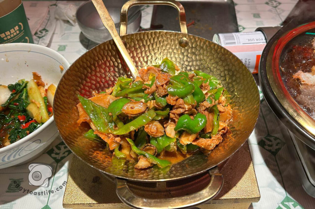 stir fried hunan pork with abalone and chili